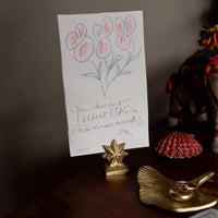 oda star brass card holder by doing goods with card on table